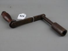 Victorian table winder with rosewood handle