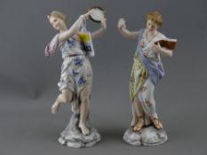 Two Continental porcelain figurines, one of a maiden with a tambourine, the other holding a book
