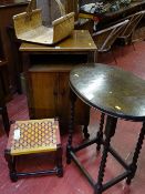 Two door mahogany bedside cabinet, an oval topped barley twist occasional table, string topped