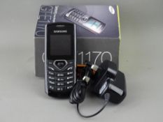 Samsung GT-E1170 mobile phone, boxed with charger