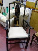 Vintage chinoiserie style black and gilt armchair with upholstered drop-in seat