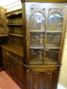 Priory style oak linenfold front dresser and near matching glass topped corner cabinet