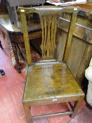 Antique oak farmhouse chair with pierced splatback