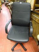 Good black leather effect swivel office armchair