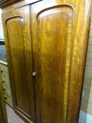 Victorian mahogany two door wardrobe with left side hanging space and four sliding trays and three