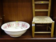 Rush seated child's chair and a Victorian pottery washbowl