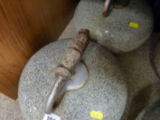 Two similar looking vintage curling stones
