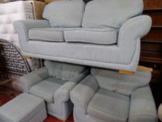 Modern light blue upholstered lounge suite of two seater settee, two armchairs and matching