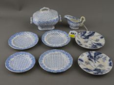 Child's miniature pottery part dinner service and two further blue and white plates, early dates