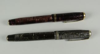 TWO VINTAGE LAMINATED PEARL PARKER VACUMATIC FOUNTAIN PENS in burgundy with gold trim & grey with