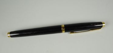 A MODERN BLACK FRENCH PARKER 75 FOUNTAIN PEN WITH GOLD TRIM