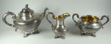 A FINE QUALITY VICTORIAN THREE-PIECE SILVER TEA-SET silver-gilt interior and of plain circular