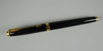 A MODERN BLACK FRENCH PARKER 75 FOUNTAIN PEN WITH GOLD TRIM