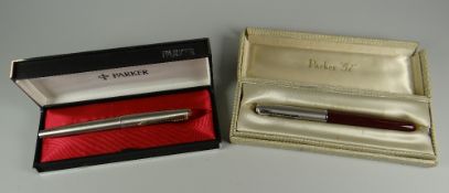 A VINTAGE BRUSHED STAINLESS STEEL PARKER 61 FLIGHTER FOUNTAIN PEN with gold trim together with a