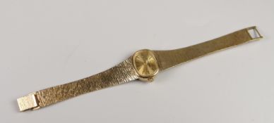 BUECHE-GIROD 9CT GOLD LADIES WRISTWATCH with bark effect strap, 37grams approx.