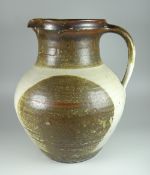 DAVID LLOYD JONES STUDIO POTTERY LARGE JUG with loop handle, ribbed exterior and two tone glaze,