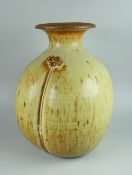 DAVID LLOYD JONES STUDIO POTTERY VASE of segmented naturalistic form and with disk neck, potter's