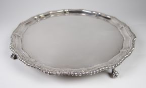 SMALL SILVER PIE CRUST EDGE SALVER raised on three ball & claw feet, Birmingham 1960, maker's mark