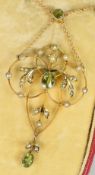 EDWARDIAN 9CT GOLD PERIDOT & SEED PEARL OPENWORK PENDANT ON CHAIN in original fitted box, Andrew