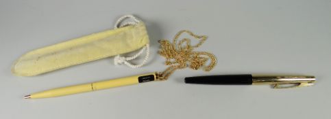 A VINTAGE PALE YELLOW SHEAFFER WHITE DOT TRZ SLIMLINE BALLPOINT PEN with chain lanyard & original
