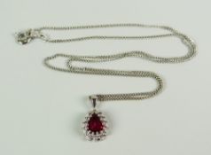 AN 18CT WHITE GOLD PEAR SHAPED RUBY & DIAMOND PENDANT on 18ct white gold chain, 5.3grams approx (