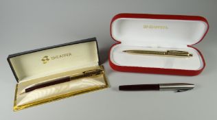 THREE VARIOUS SHEAFFER PENS including a vintage burgundy Sheaffer Triumph with brushed chrome