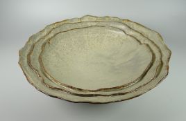 J BOOBYER STUDIO POTTERY DISH of naturalistic three layer form, signed, 32cms diam