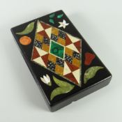 NINETEENTH CENTURY DERBYSHIRE BLACK MARBLE RECTANGULAR PAPERWEIGHT having patchwork or scrapwork