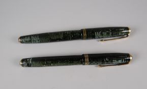 TWO VINTAGE LAMINATED EMERALD PEARL PARKER VACUMATIC FOUNTAIN PENS, both with gold trim
