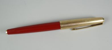 A VINTAGE RAGE RED PARKER 61 FOUNTAIN PEN with rolled gold grid patterned cap (arrow on nib unit