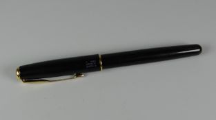 A MODERN BLACK PARKER SONNET FOUNTAIN PEN WITH GOLD TRIM