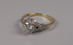 AN ANTIQUE PLATINUM & 18CT GOLD DIAMOND SOLITAIRE SPLIT FLORAL SHOULDER RING, diam 0.8ct visual
