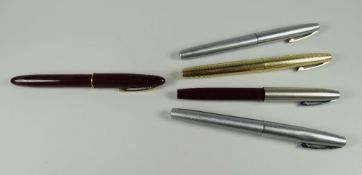 THREE VINTAGE SHEAFFER TRIUMPH FOUNTAIN PENS one burgundy with brush chrome cap & chrome plated