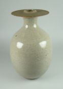 DAVID LLOYD JONES STUDIO POTTERY VASE of ovoid form and with disk neck, mottled grey glaze, potter's