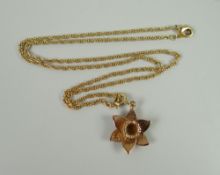 A 9CT ROSE GOLD CLOGAU DAFFODIL PENDANT & FINE NECKLACE