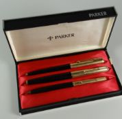 A VINTAGE BLACK PARKER 61 FOUNTAIN PEN, BALLPOINT PEN & PENCIL SET with rolled gold caps (in
