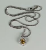 AN 18K WHITE GOLD TOPAZ & DIAMOND PENDANT ON 9CT WHITE GOLD CHAIN, 6.3grams approx. overall (in