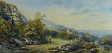 W GRAY watercolour - coastal village scene with church & four figures by a stile & on a path,