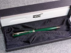 A BOXED GREEN MONTBLANC GENERATION PROPELLING PENCIL