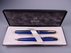 A MODERN (2001-2004) TRANQUIL BLUE PARKER INFLECTION FOUNTAIN PEN & BALLPOINT PEN SET with gold