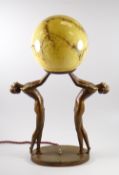 A GOOD ART DECO FIGURAL TABLE LAMP composed of two nimble females standing with globular marbled