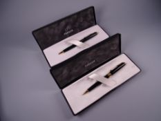 A MODERN GREEN LAQUE PARKER SONNET BALLPOINT PEN in original box & a modern solid black Laque Parker
