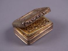 A FINE GILT SILVER VINAIGRETTE, the lid decorated with star and other symbols and with a fine floral