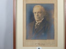 A PHOTOGRAPHIC PORTRAIT OF DAVID LLOYD GEORGE, signed in full beneath, 30 x 22.5 cms