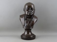 A BRONZED COMPOSITION BUST OF WINSTON S CHURCHILL, 33 cms high