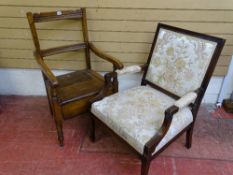 TWO VINTAGE ARMCHAIRS to include a Regency mahogany example, with floral upholstery and a vintage