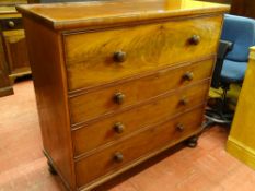 A VICTORIAN MAHOGANY CHEST OF FOUR DRAWERS with turned wooden knobs and deep top drawer, on
