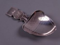 A FINE SILVER CADDY SPOON with acorn shaped bowl and shaped monogram handle, London 1809, maker