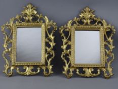 A PAIR OF VINTAGE CAST BRASS & GILT DECORATED ROCOCO STYLE WALL MIRRORS, 30 x 22.5 cms