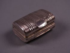 AN OBLONG SILVER TRUNK SHAPED SNUFF BOX with hinged lid, London 1817 by William Elliott